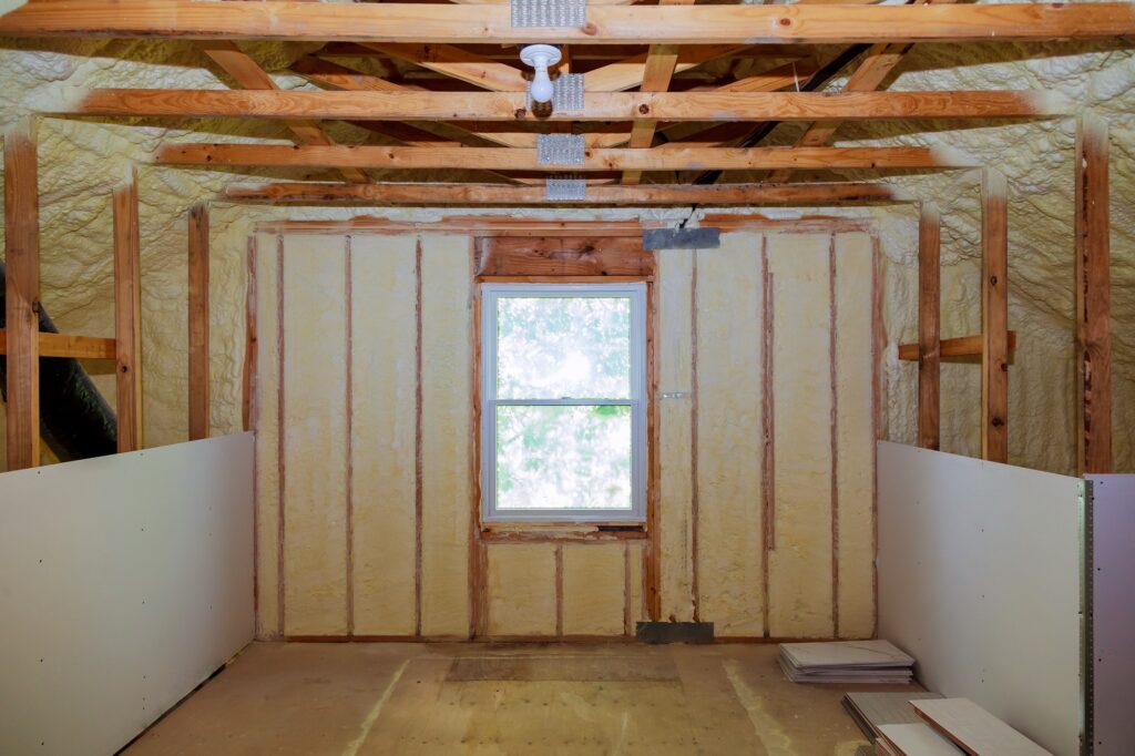 Insulation of attic with fiberglass cold barrier and insulation material thermal insulation attic