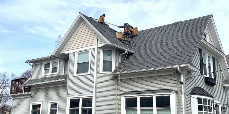 Professional roof repair service for Birmingham Michigan homes by The Modern Pros